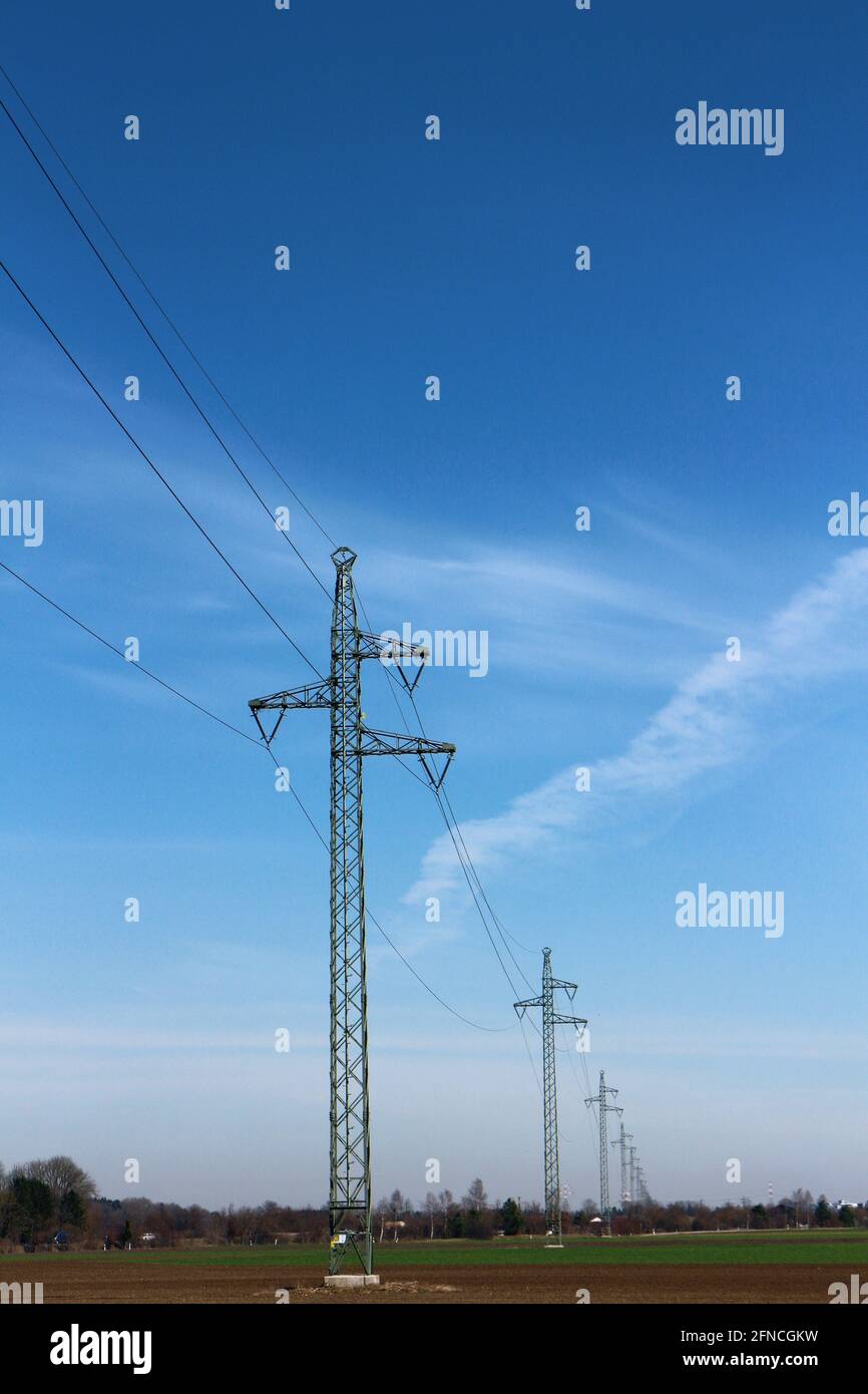 Electricity pylons in the countryside Stock Photo - Alamy