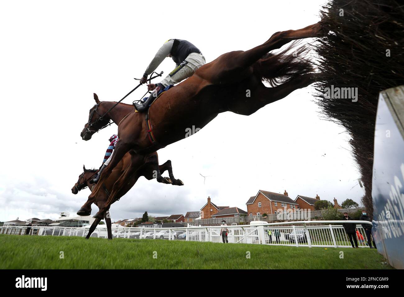 Atlantic Storm ridden by jockey Charlie Hammond (left) on their way to winning the Visit racingtv.com Handicap Chase with Larch Hill ridden by jockey Sam Twiston-Davies second at Stratford-on-Avon Racecourse. Picture date: Sunday May 16, 2021. Stock Photo