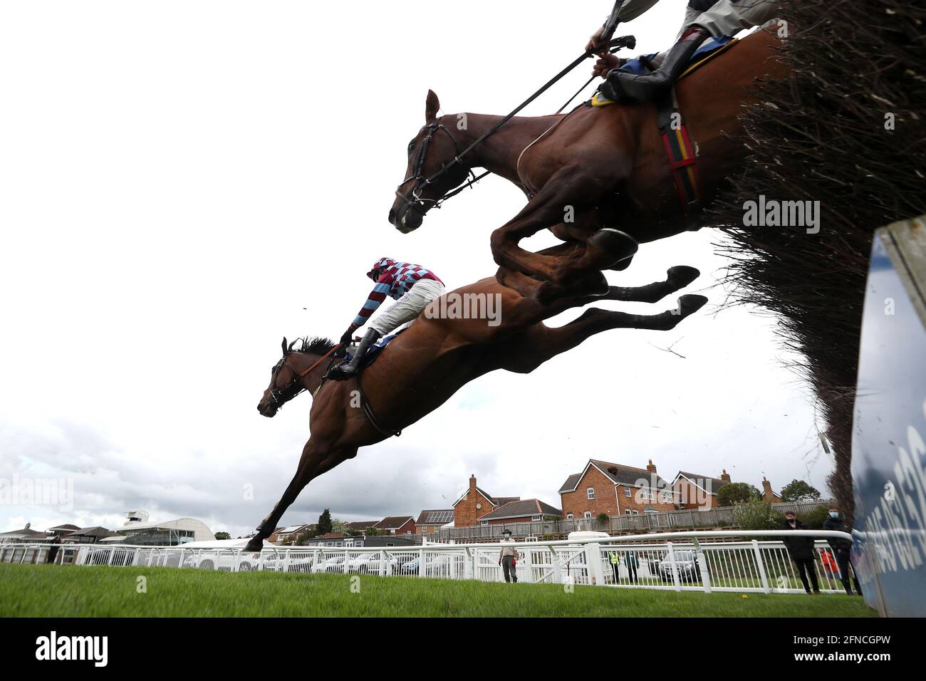 Atlantic Storm ridden by jockey Charlie Hammond (left) on their way to winning the Visit racingtv.com Handicap Chase with Larch Hill ridden by jockey Sam Twiston-Davies second at Stratford-on-Avon Racecourse. Picture date: Sunday May 16, 2021. Stock Photo