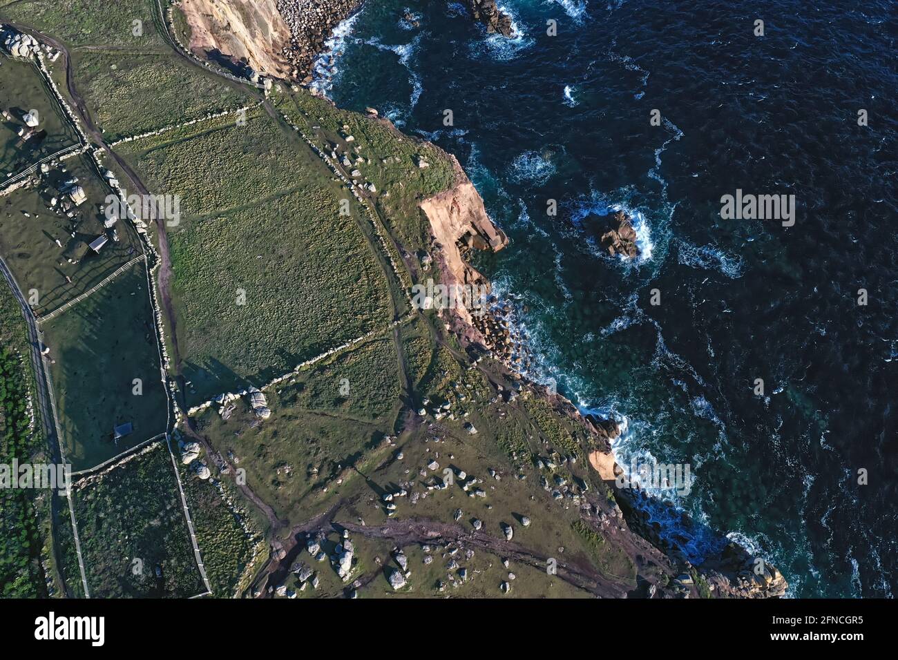 unusual aerial view looking down on dramatic cliffs, abstract background photo Stock Photo