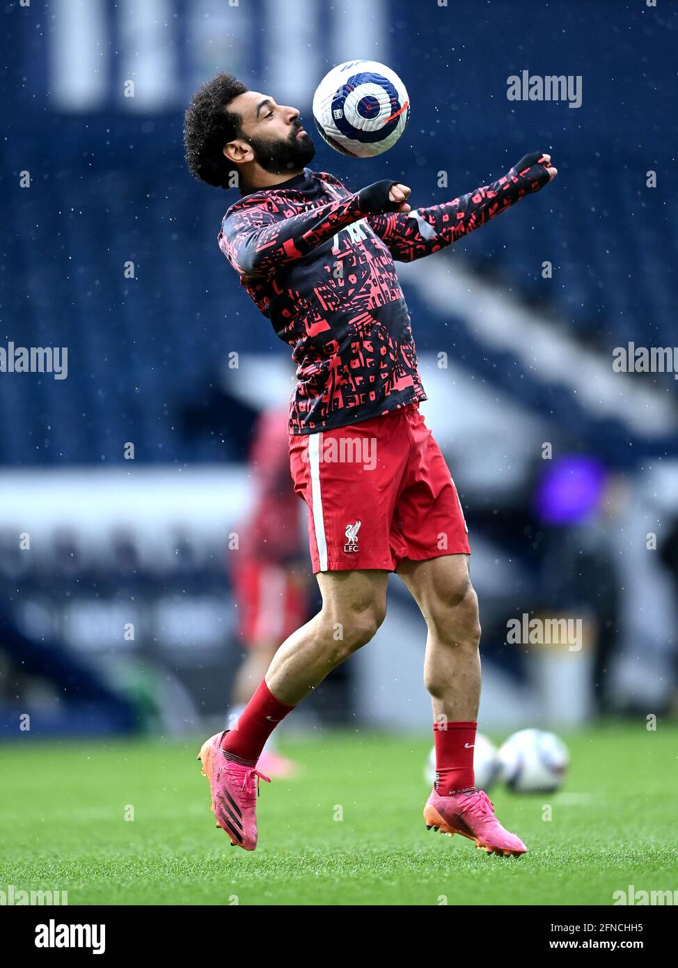 Liverpool's Mohamed Salah warming up prior to kick-off during the Premier League match at The Hawthorns, West Bromwich. Picture date: Sunday May 16, 2021. Stock Photo
