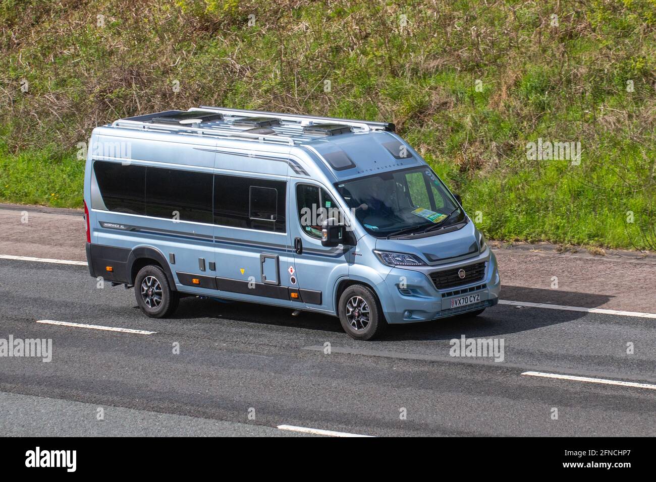 2020 Fiat Ducato Caravans and Motorhomes, campervans on Britain's roads, RV leisure vehicle, family holidays, caravanette vacations, Touring caravan holiday, van conversions, Vanagon autohome, life on the road,  auto-sleeper Stock Photo