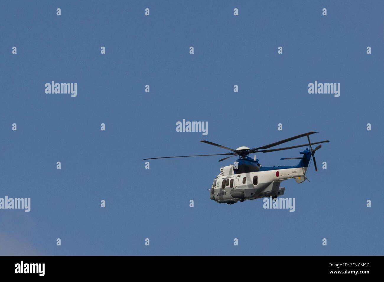 An Airbus Helicopter H225M 'Super Puma' operated by ATLA (Acquisitions, Technology and Logistics Agency) which is part of the Japanese Ministry of Defense flies near Naval Air Facility in Kanagawa. Stock Photo