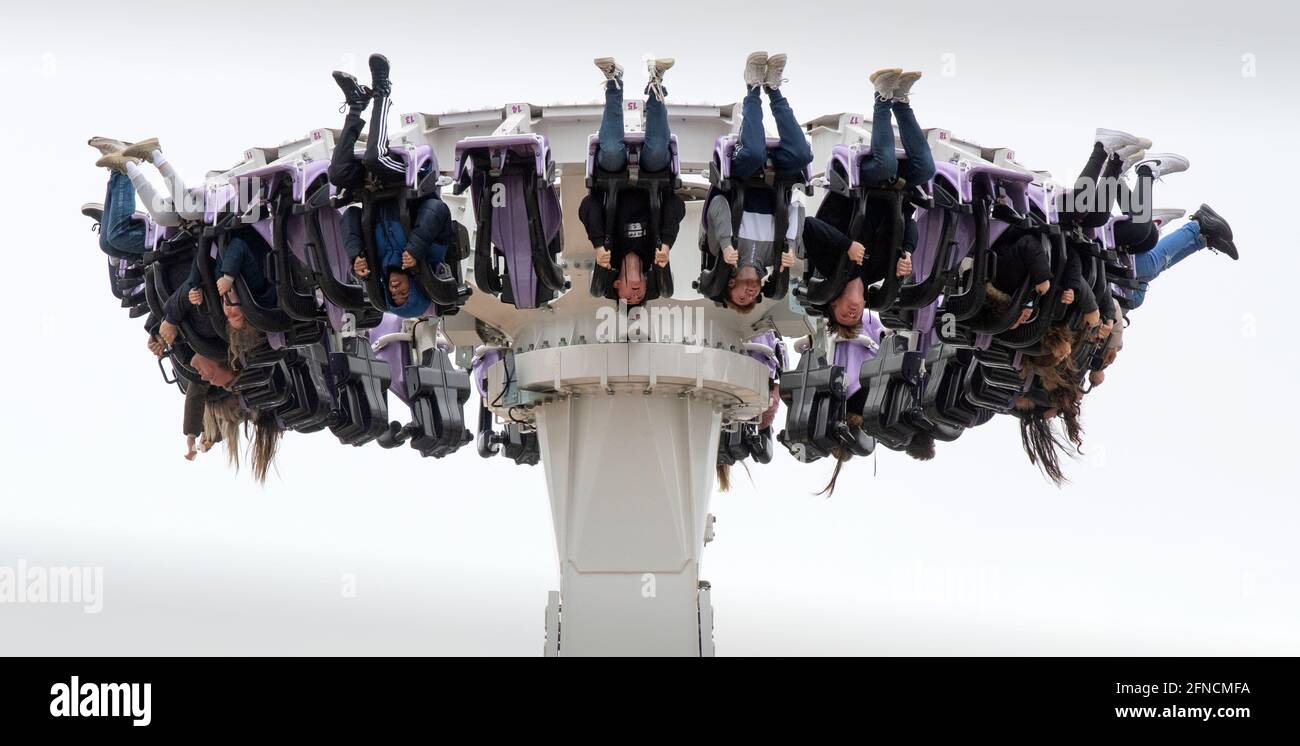 Southend on Sea Essex England UK 15 May 2021 Visitors to Adventure Land enjoy the thrill of Axis one of the newest rides in the park on Southend Seafr Stock Photo