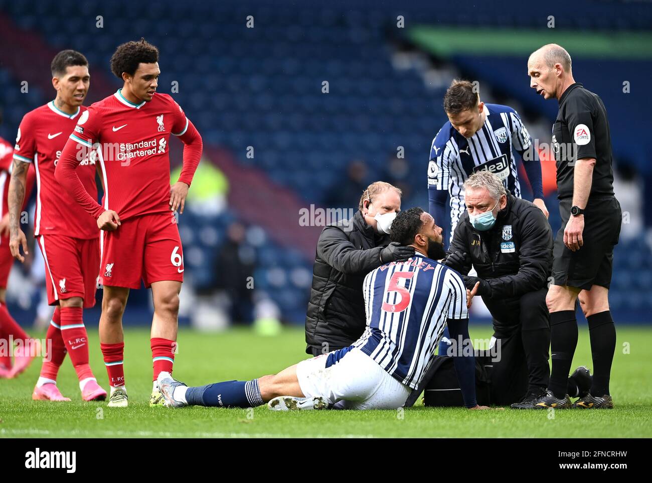 West Bromwich Albion's Kyle Bartley receives treatment for an injury during the Premier League match at The Hawthorns, West Bromwich. Picture date: Sunday May 16, 2021. Stock Photo