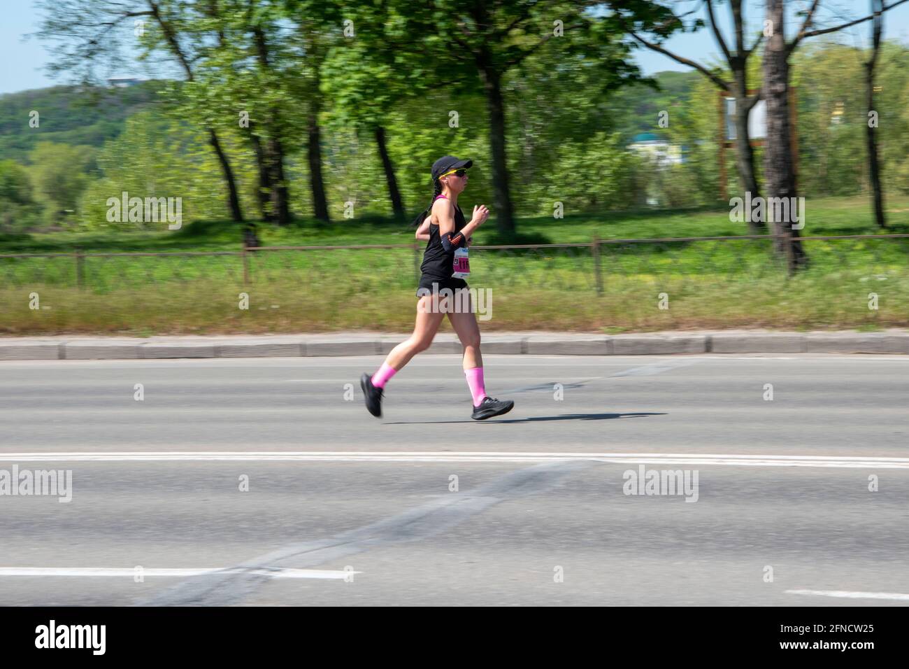 Ukraine, Kyiv - 16 May 2021: HOKA 10 km. running competition at Duathlon Kyiv Cup 2021 event. Editorial Stock Photo