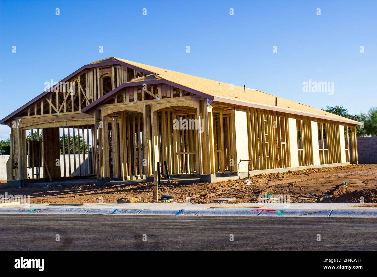 Framing Stage Of New Home In Housing Development Stock Photo