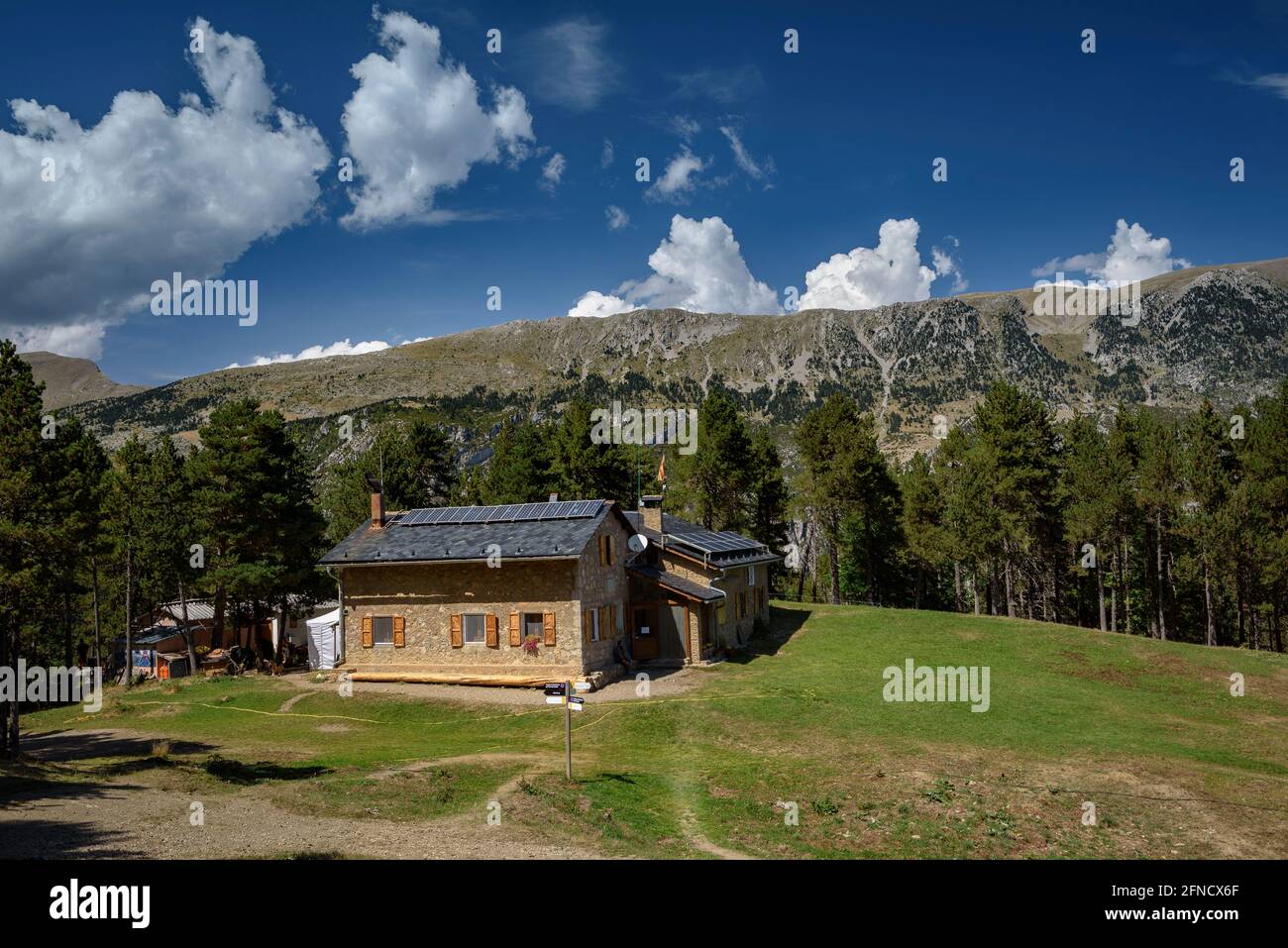 Lluís Estasen mountain hut and the Cadí south face in summer (Barcelona province, Catalonia, Spain, Pyrenees) Stock Photo