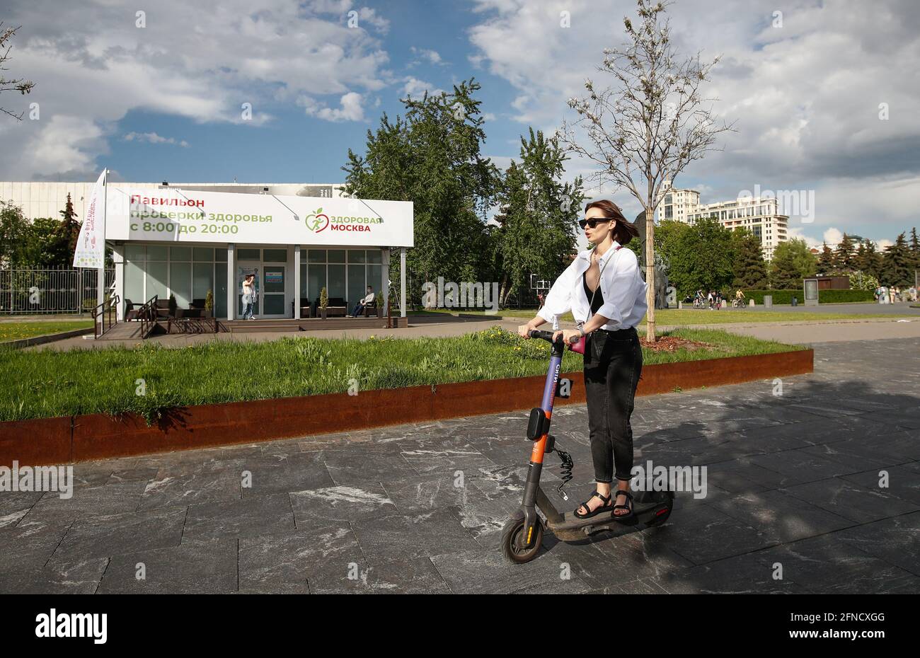 Moscow Russia 16th May 21 A Woman On A Kick Scooter Rides Past A Healthy Moscow Pavilion At The Muzeon Park Of Arts A Total Of 46 Such Pavilions Are Open To Moscow Russia 16th May 21 A Woman On A Kick Scooter Rides Past A Healthy Moscow Pavilion At The Muzeon Park Of Arts A Total Of 46 Such Pavilions Are Open To