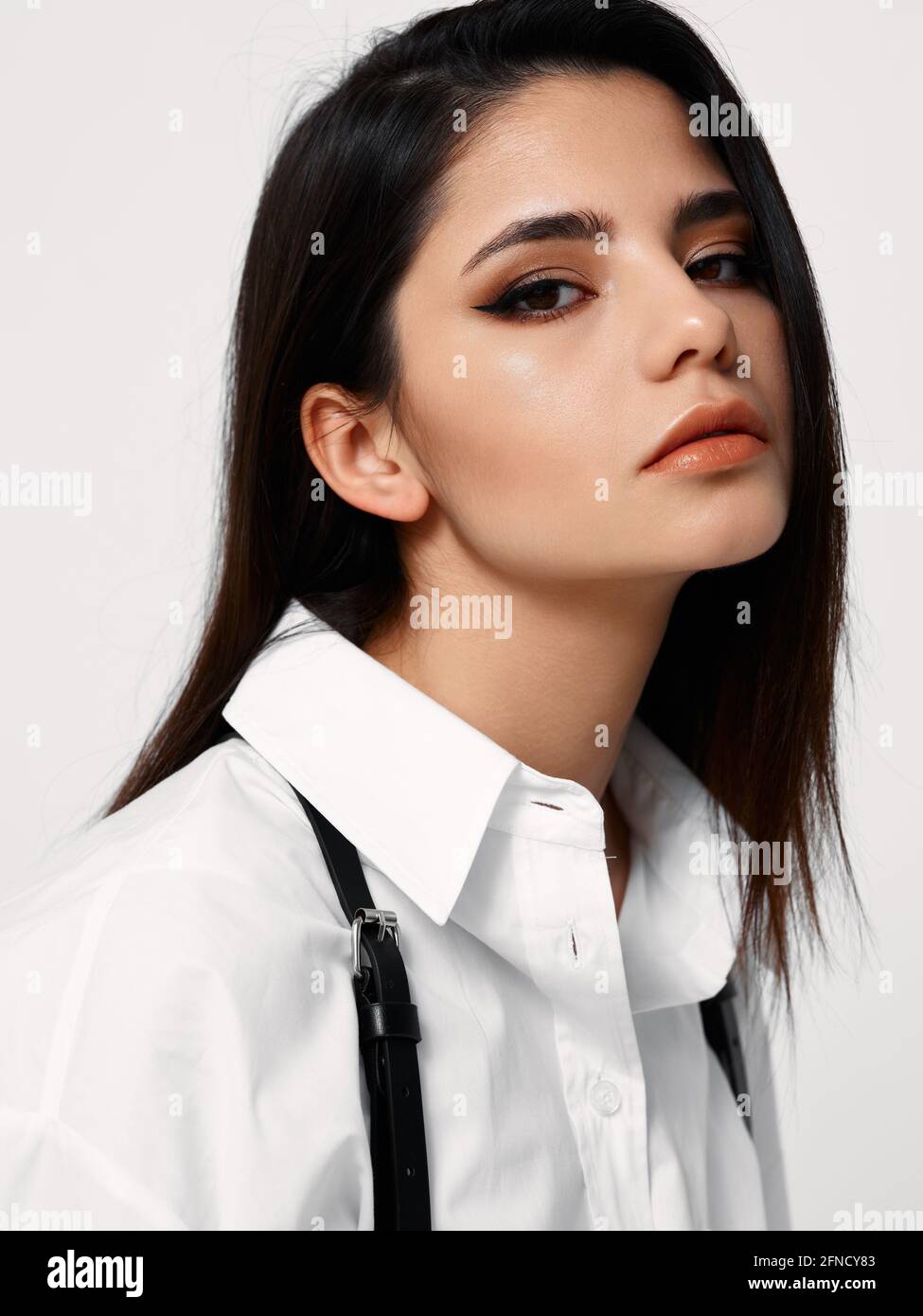 Attractive model in suspenders hi-res stock photography and images - Alamy