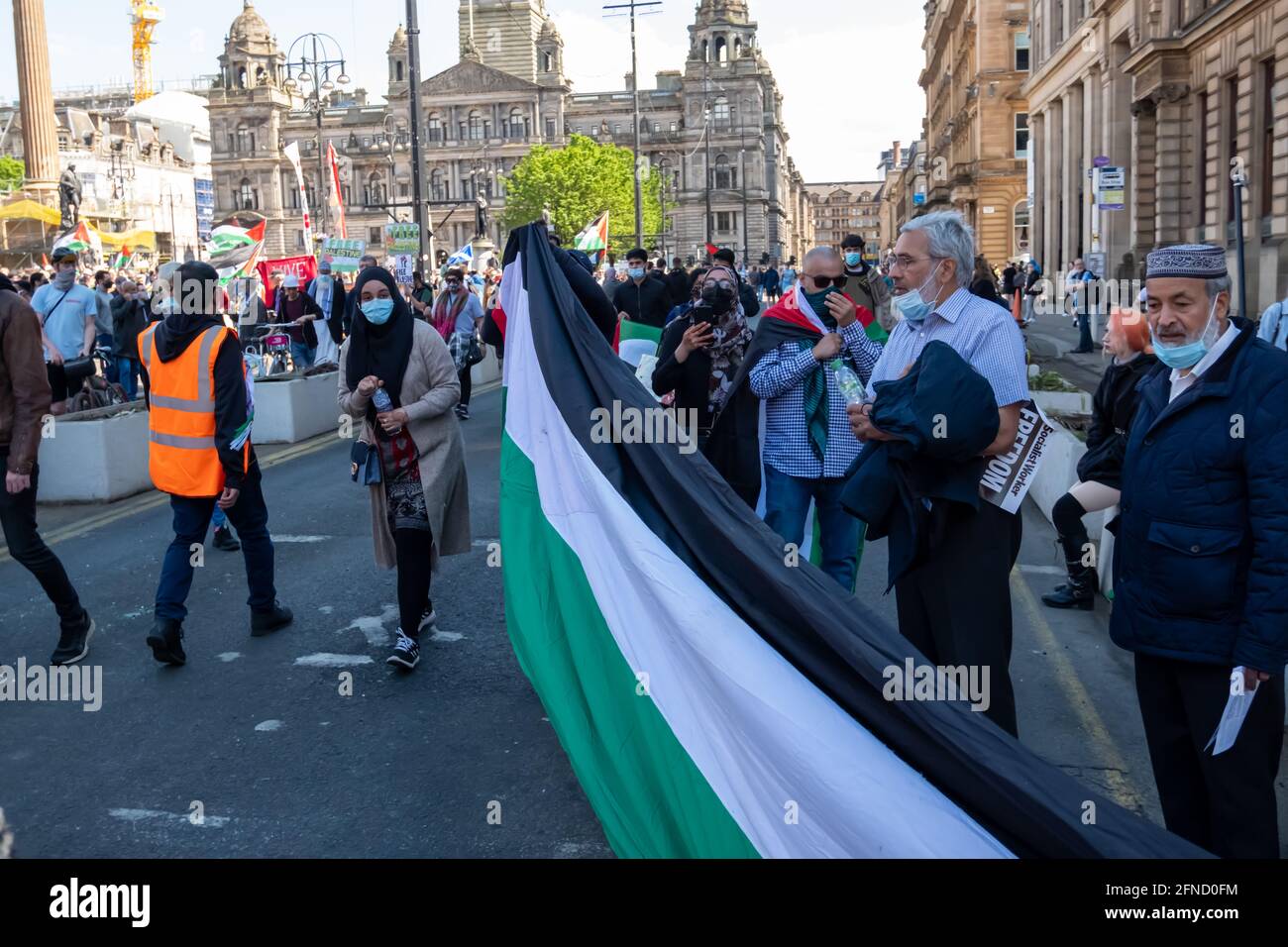 Glasgow, Scotland, UK. 16th May, 2021. People attend a rally in George ...