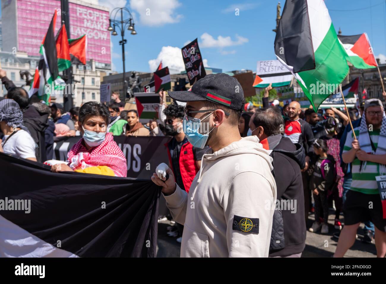 Glasgow, Scotland, UK. 16th May, 2021. People attend a rally in George