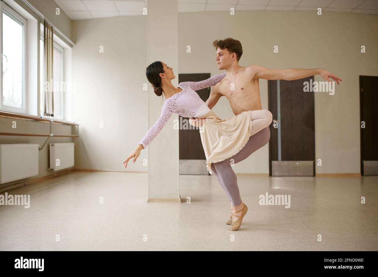 Couple of ballet dancers, dancing in action Stock Photo