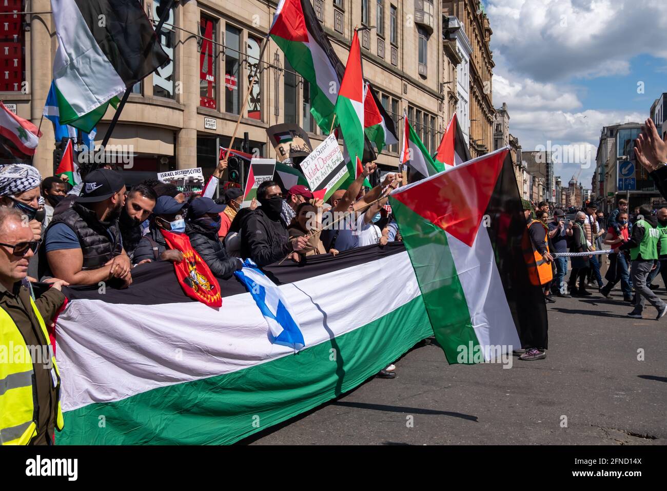 Glasgow, Scotland, UK. 16th May, 2021. People attend a rally in George