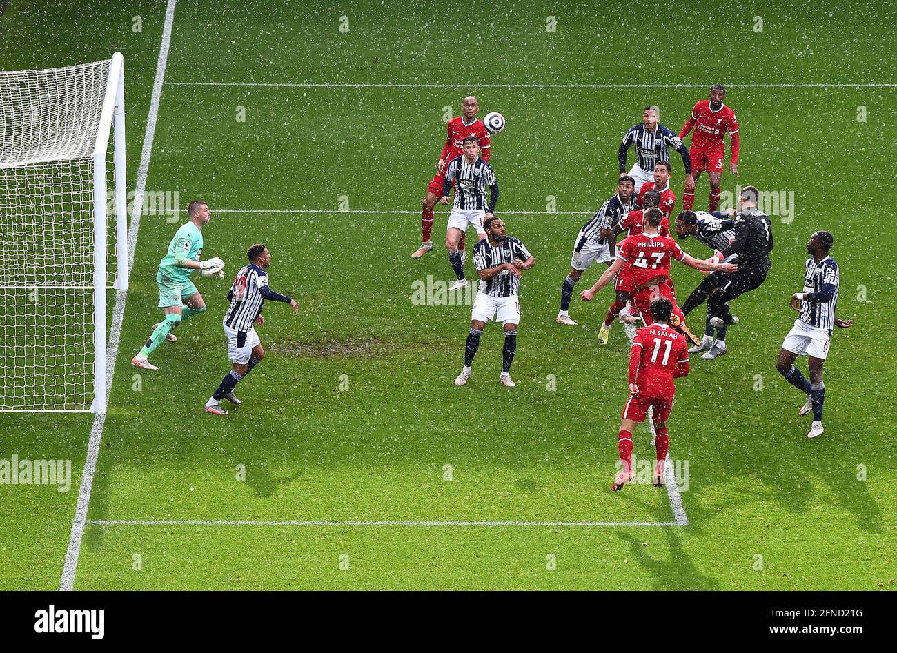 Liverpool goalkeeper Alisson (second right) scores their side's second goal of the game during the Premier League match at The Hawthorns, West Bromwich. Picture date: Sunday May 16, 2021. Stock Photo