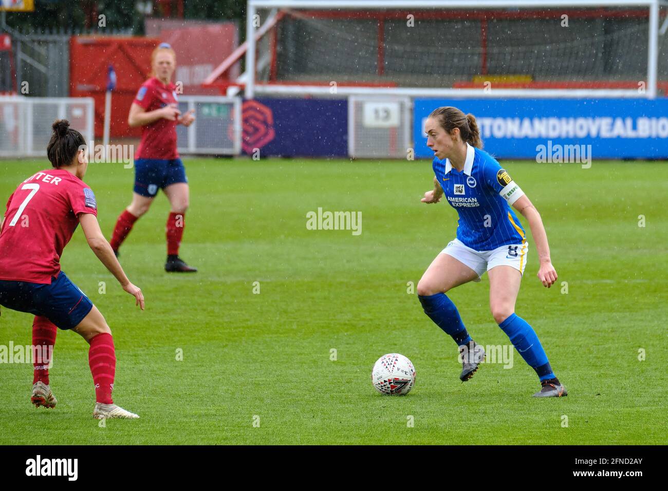 Crawley, UK. 16th May, 2021. Katie Nutter (7 Huddersfield Town) closing down Megan Connolly (8 Brighton & Hove Albion) during the FA Cup game between Brighton & Hove Albion and Huddersfield Town at The Peoples Pension Stadium in Crawley Credit: SPP Sport Press Photo. /Alamy Live News Stock Photo