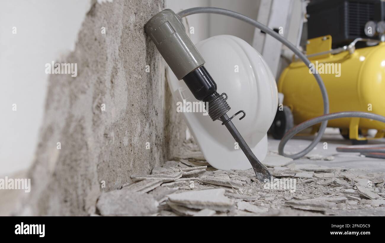 house renovation concept, wall in demolition with plaster rubble and