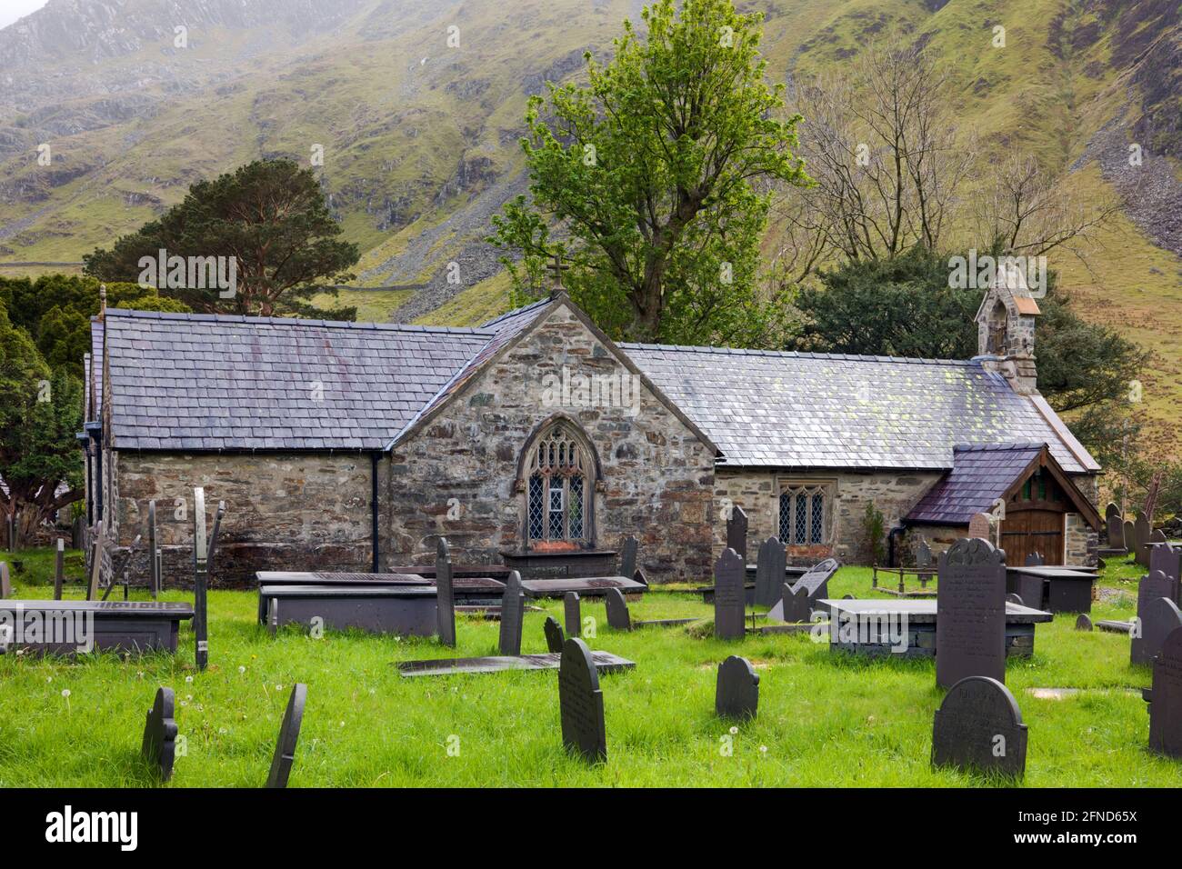 St Peris Church in the village Nant Peris, Snowdonia, North Wales, dates from at least the 14th century. Stock Photo