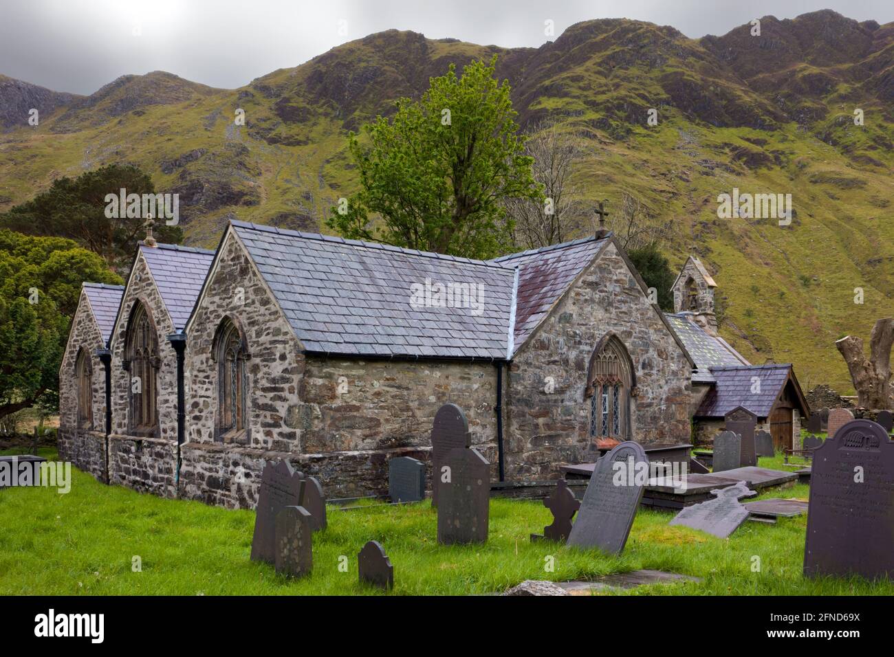 St Peris Church in the village Nant Peris, Snowdonia, North Wales, dates from at least the 14th century. Stock Photo