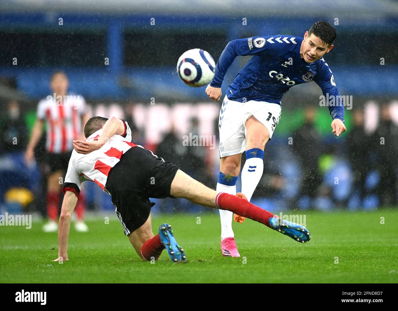 Everton's James Rodriguez (right) shoots towards goal during the Premier League match at Goodison Park, Liverpool. Picture date: Sunday May 16, 2021. Stock Photo