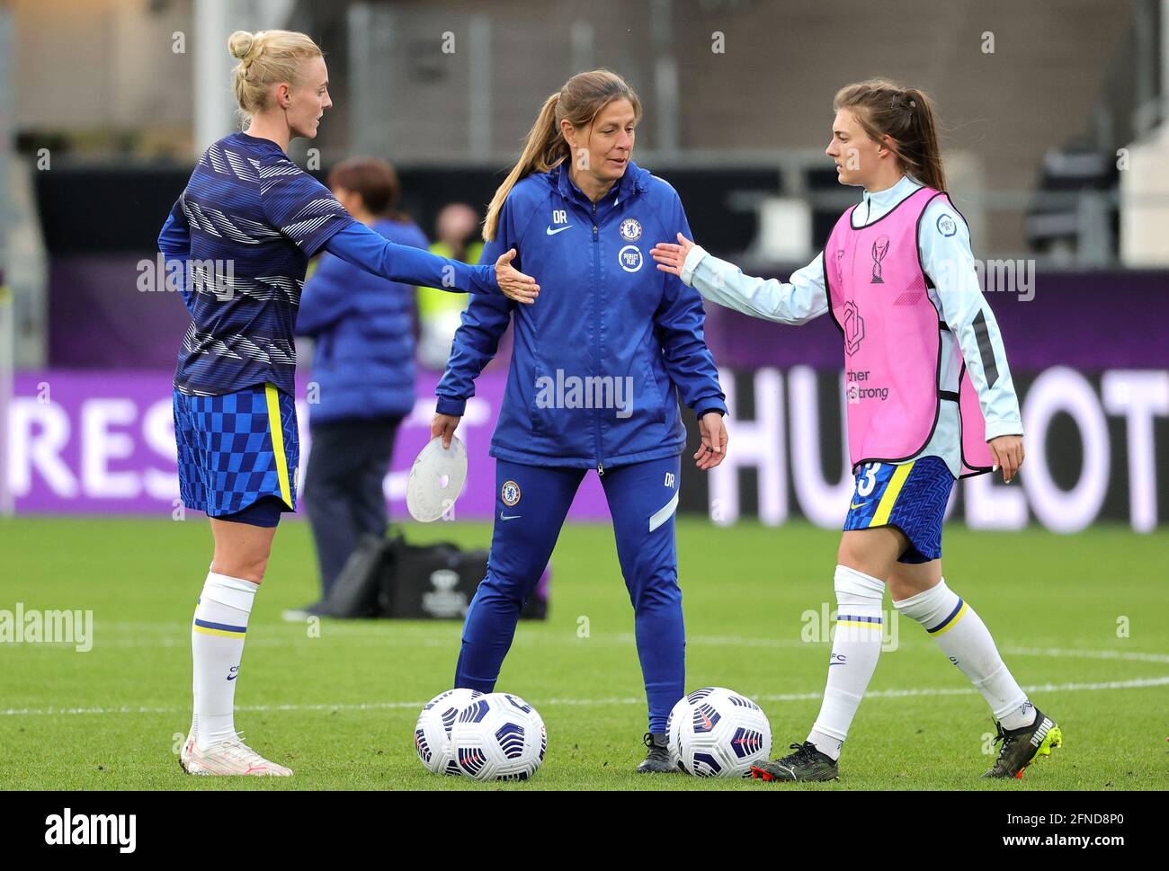 Chelsea assistant coach Denise Reddy oversees the warm up prior to kick ...