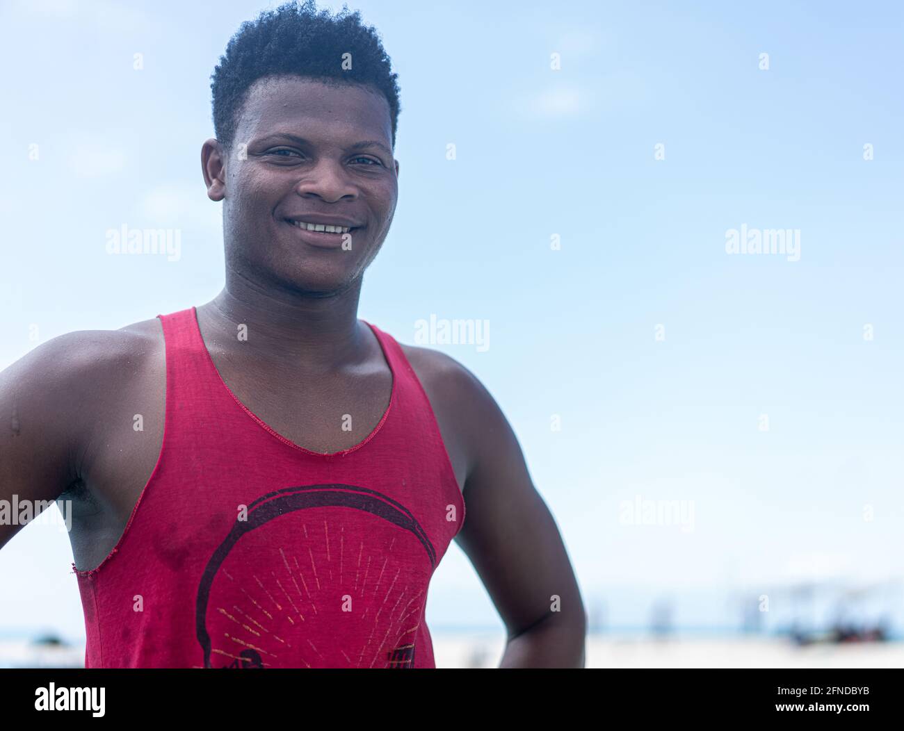 Young black man working on the coast Stock Photo