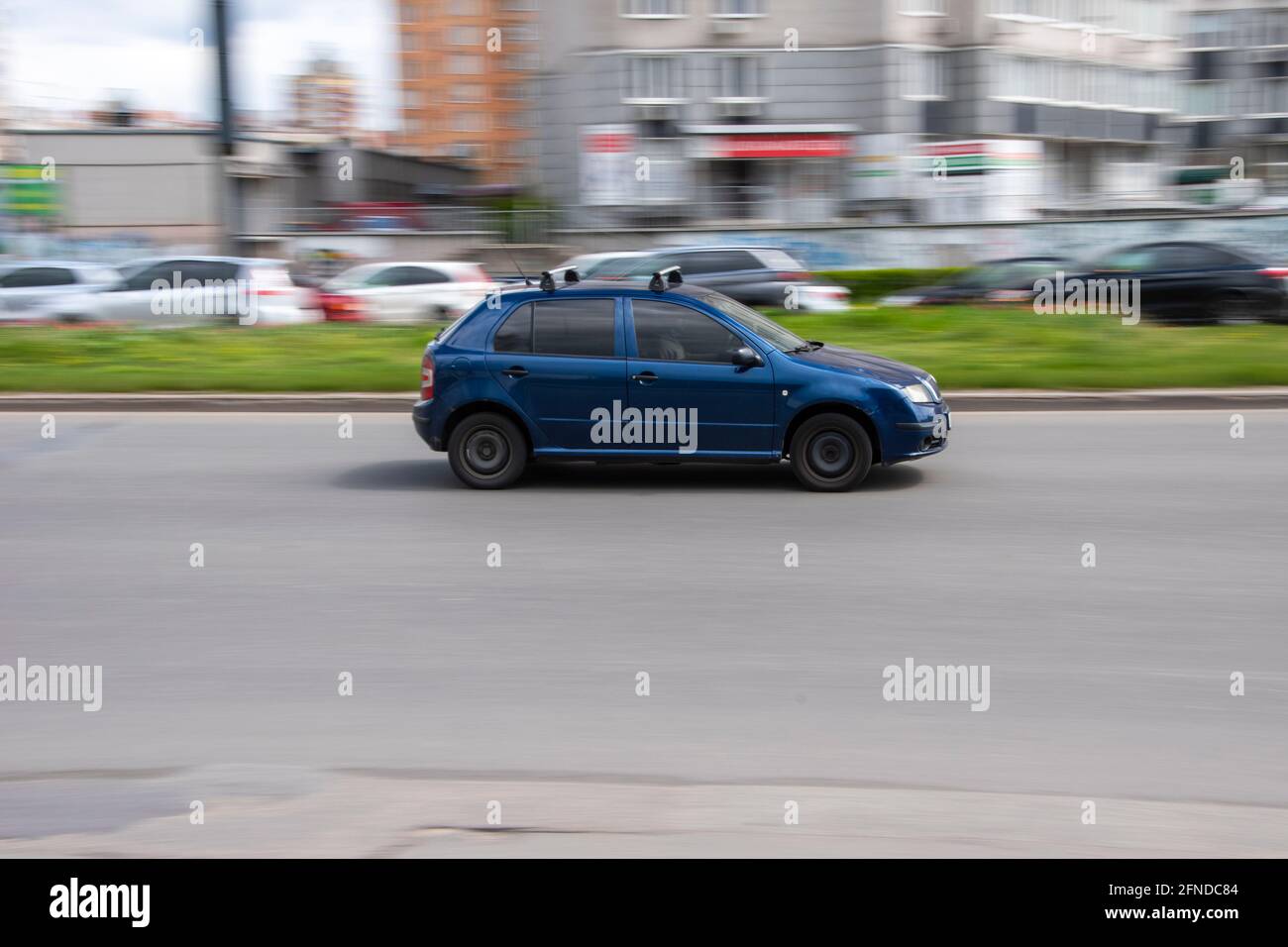 Ukraine, Kyiv - 26 April 2021: Blue Skoda Fabia car moving on the street. Editorial Stock Photo