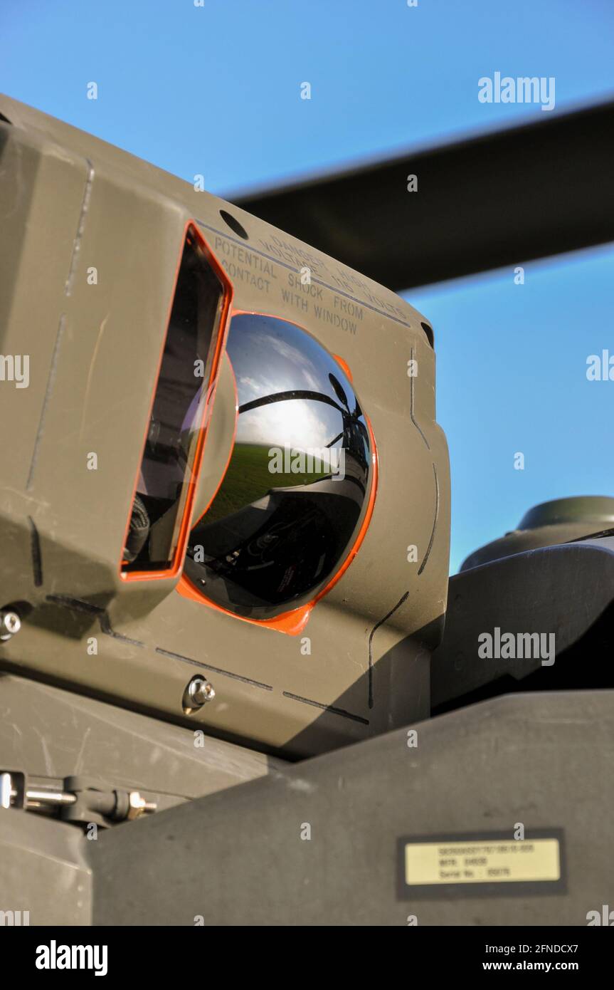 Detail of sensor on a AgustaWestland WAH-64 Apache gunship helicopter of the British Army, Army Air Corps. Pilot Night Vision Sensor, PNVS. Mirrored Stock Photo