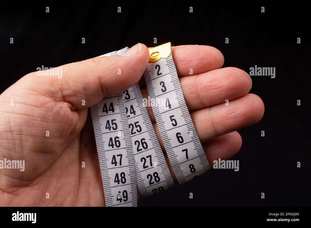 Measuring tape, metric tape measure for needlework, sewing work etc Stock  Photo - Alamy