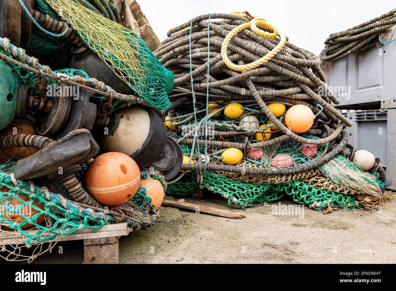 https://c8.alamy.com/comp/2FNDNHT/mooring-ropes-and-nets-on-a-fishing-boat-accessories-needed-for-fishing-spring-season-2FNDNHT.jpg