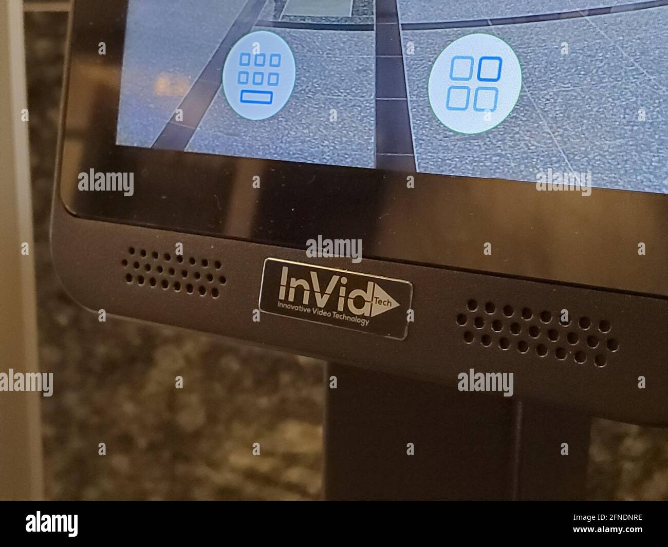 Close-up of the InVid Tech company logo on a temperature measurement and face recognition terminal in San Ramon, California, February 18, 2021. () Stock Photo