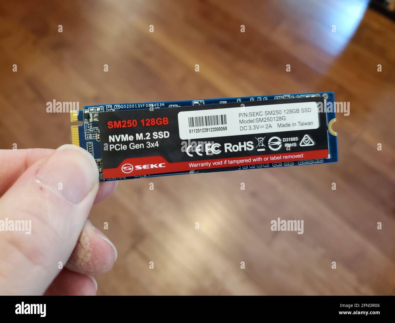 Close-up of fingers holding a 128-gigabyte NVMe M2 SSD computer storage  card, photographed in Lafayette, California, March 16, 2021 Stock Photo -  Alamy