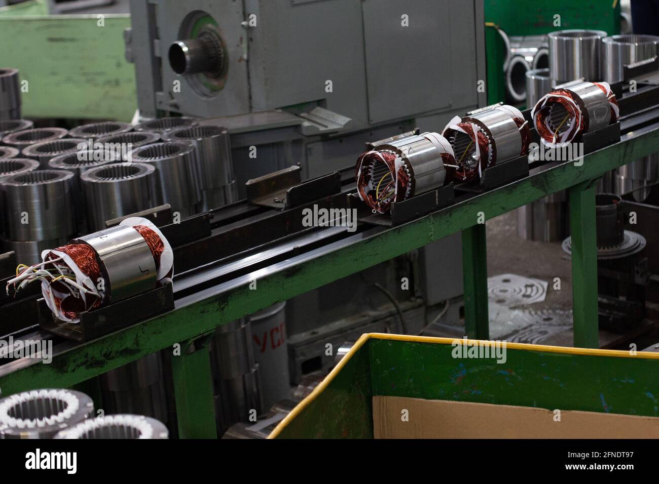 stators on assembly line of Semiautomated manual production of