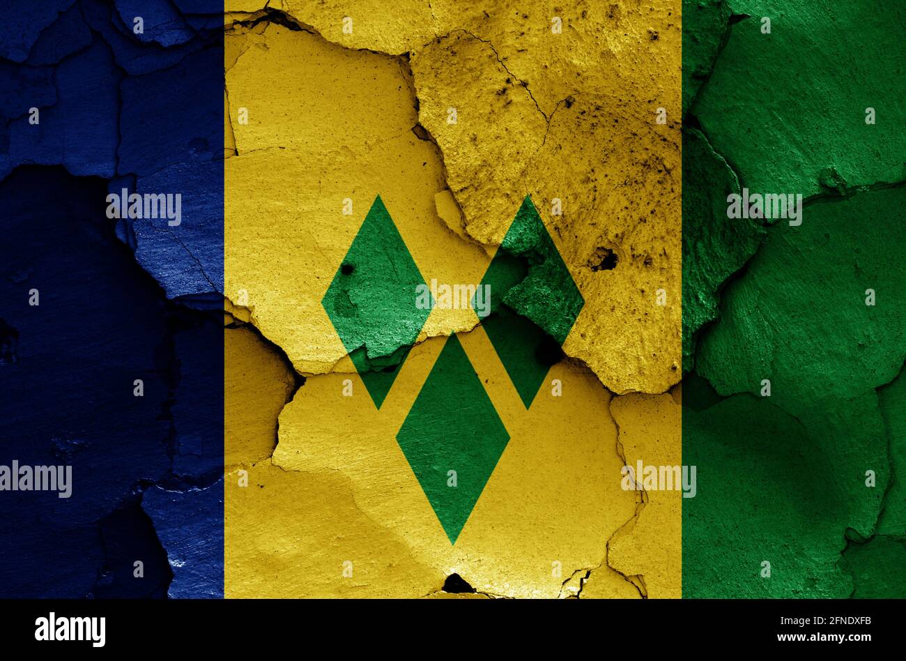 flag of St Vincent and the Grenadines painted on cracked wall Stock Photo