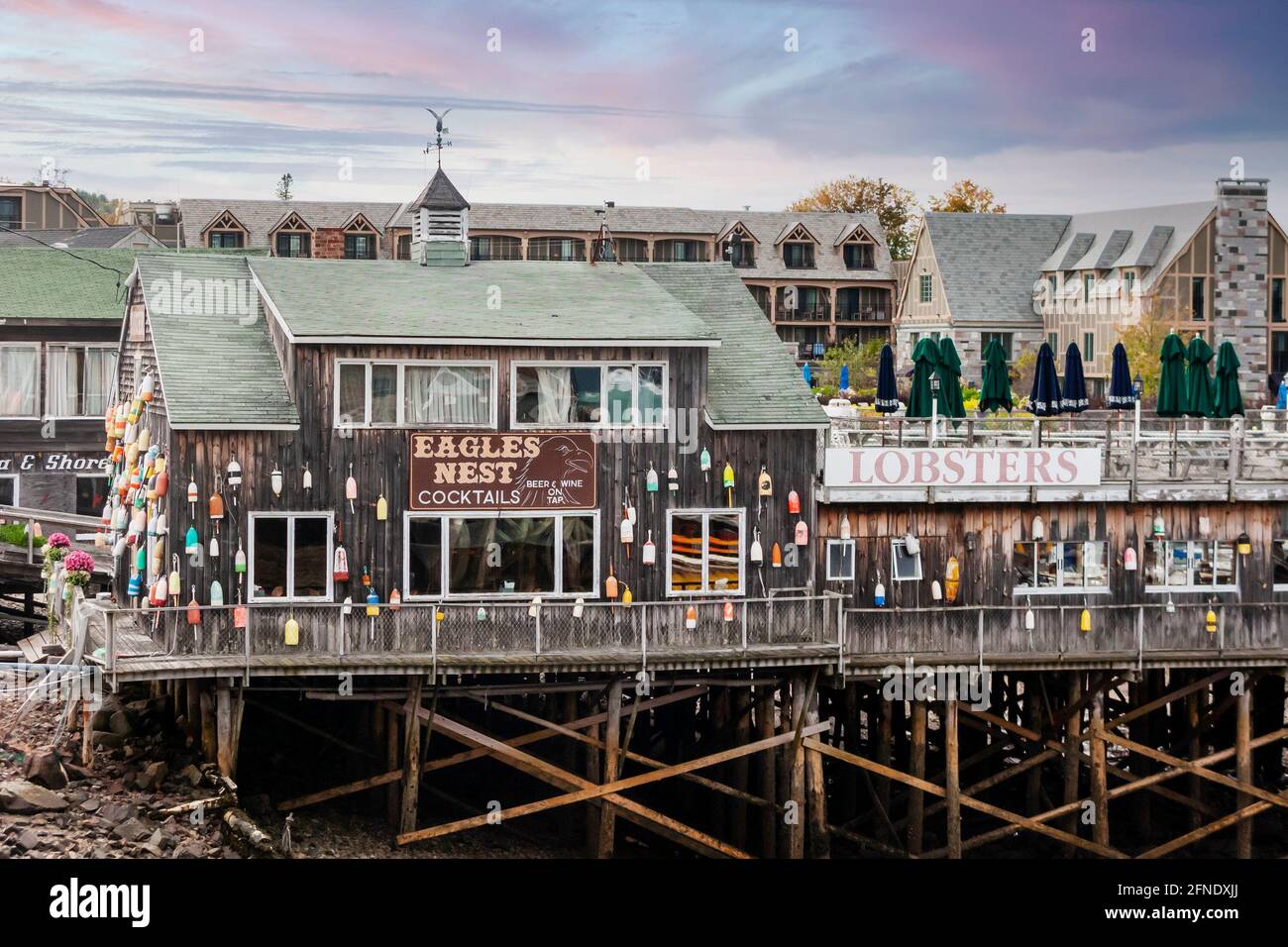 View of the Eagles Nest restaurant on pilings in Bar Harbor, Maine, USA. Stock Photo
