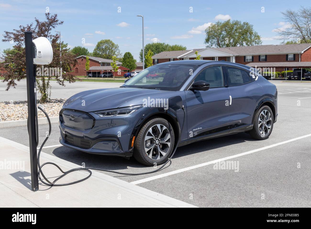 Kokomo Circa May 21 Ford Mustang Mach E Suv Display At A Charging Station The Mustang Mach E Is Ford S First All Electric Crossover And Has A Ra Stock Photo Alamy