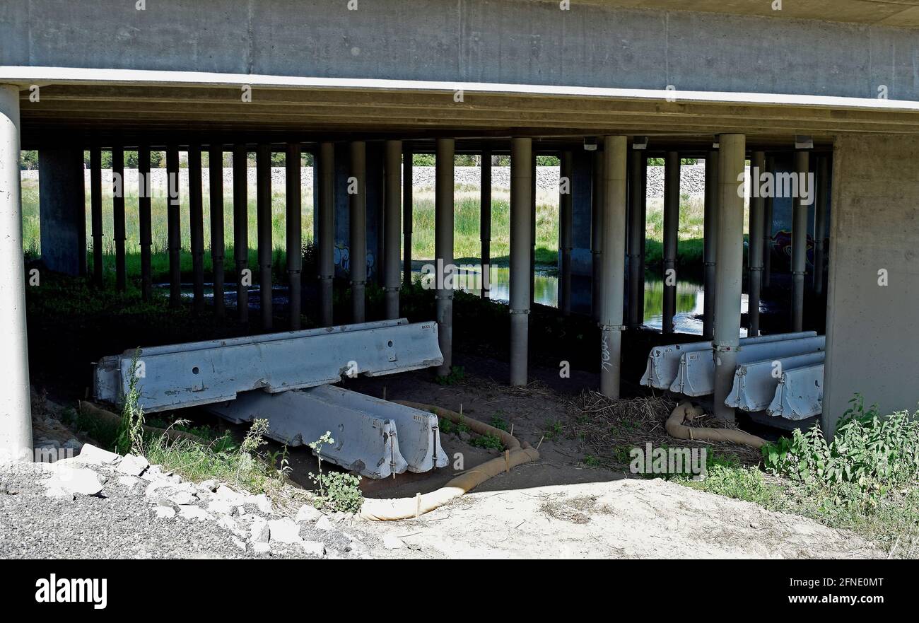 new cement barriers on the Alameda Creek under the 880 freeway overpass