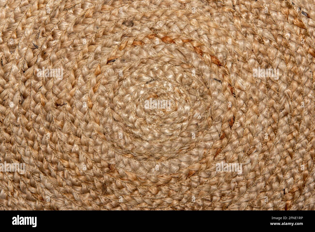 Beautiful circle pattern on handmade woven raffia basket Stock Photo