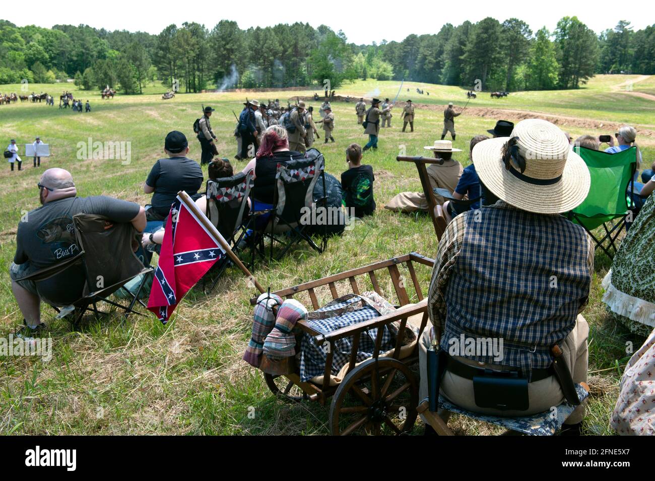 Resaca, GA, USA. 16th May, 2021. History buffs gather on a hillside to