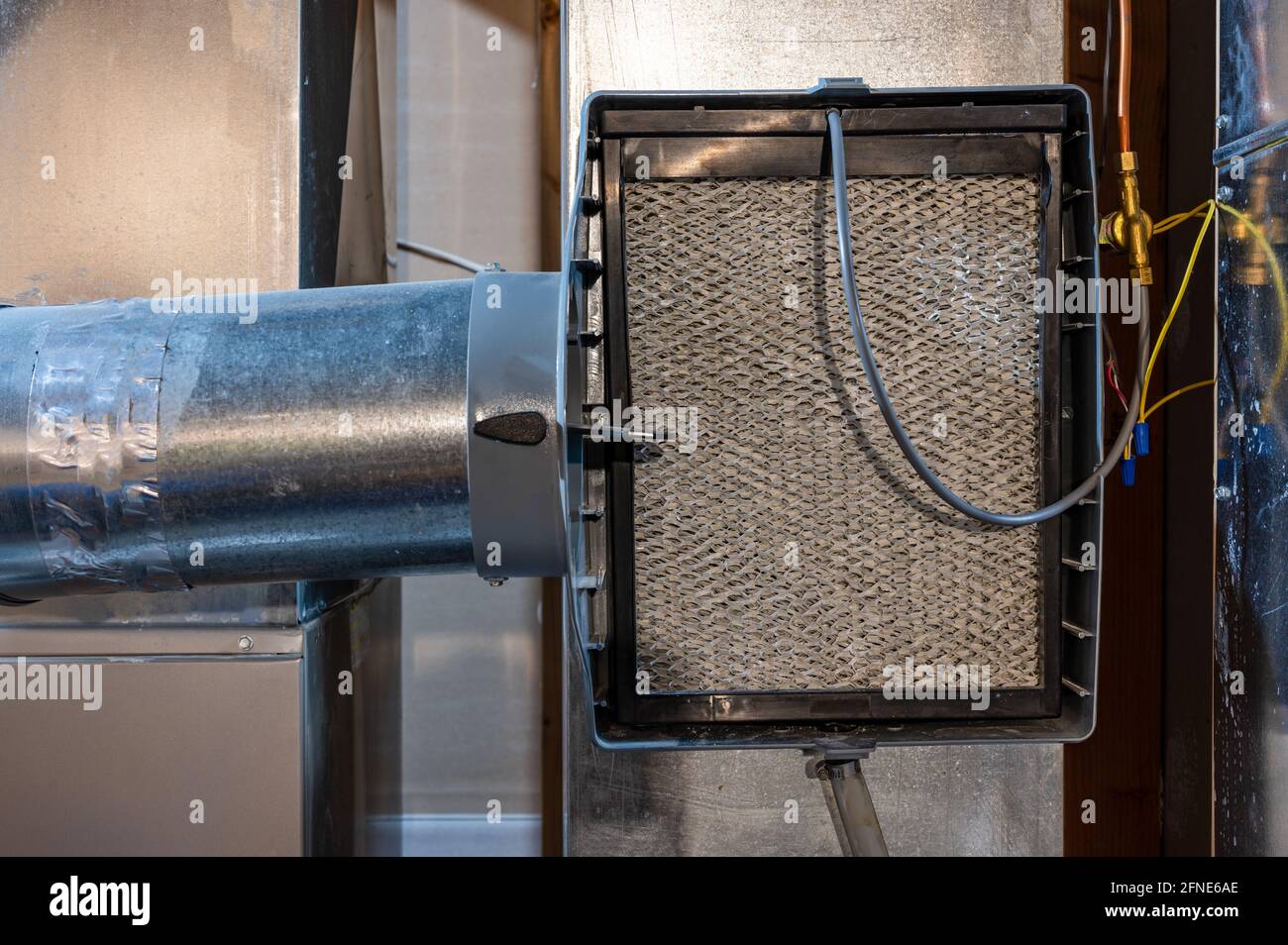 Whole house humidifier used in colder climate areas to increase indoor