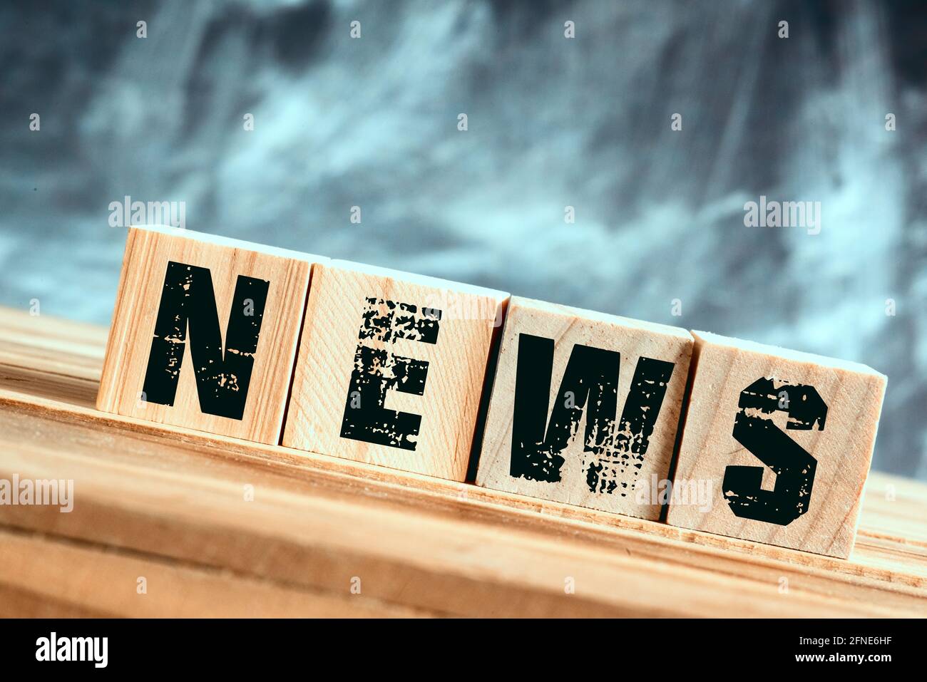 Wooden letters and the word News Stock Photo