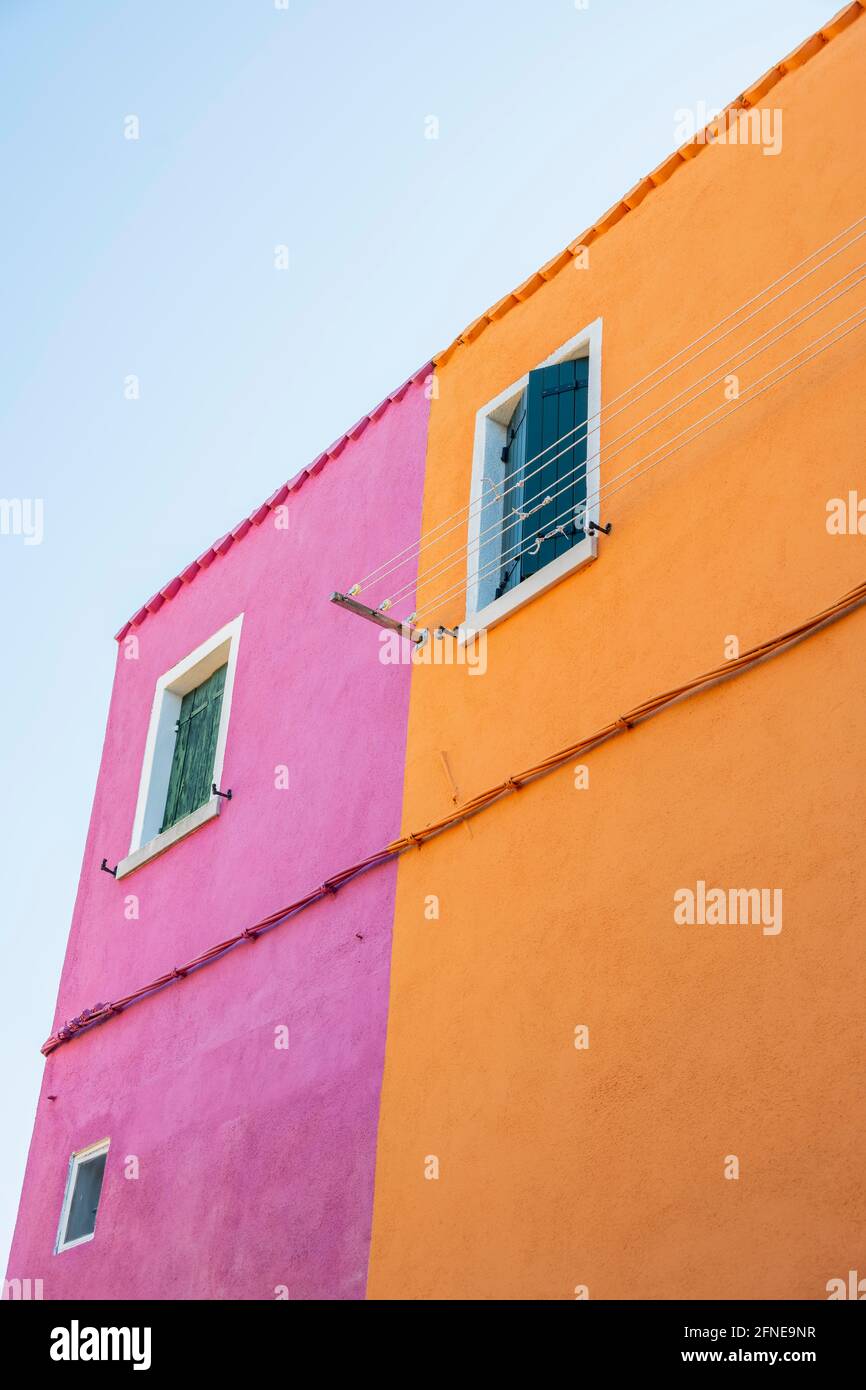 Orange and pink wall, colorful house wall, colorful facade, Burano Island, Venice, Veneto, Italy Stock Photo