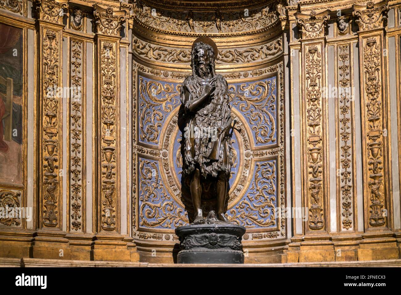 St. John the Baptist, bronze figure by Donatello, 1457, Chapel of St. John or Cappella di San Giovanni Battista, Siena Cathedral, Duomo Santa Maria Stock Photo