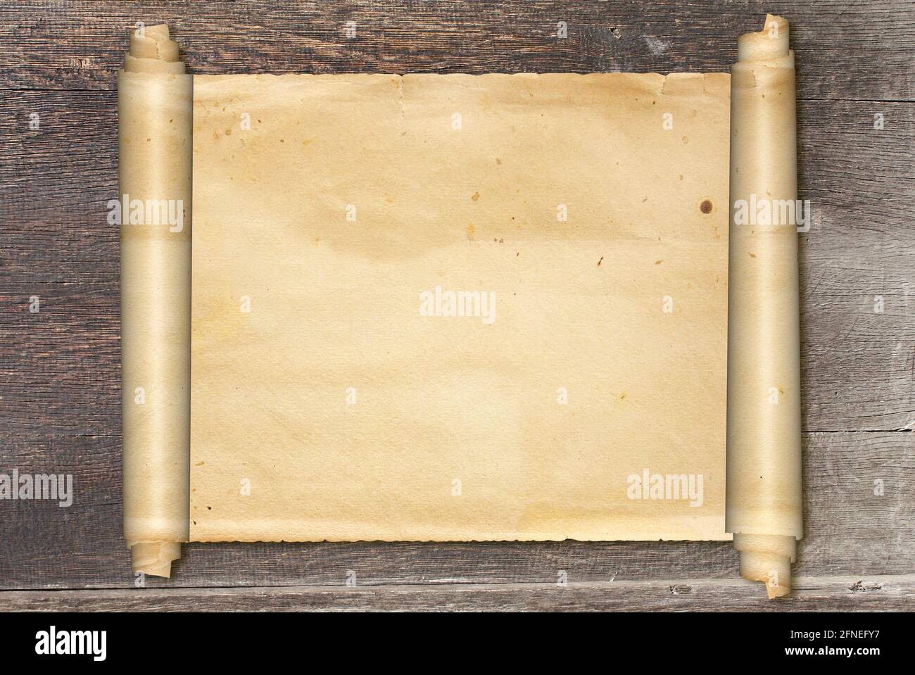 Scroll of old parchment on vintage wooden board. Copy space for your text. Mock up template. 3d