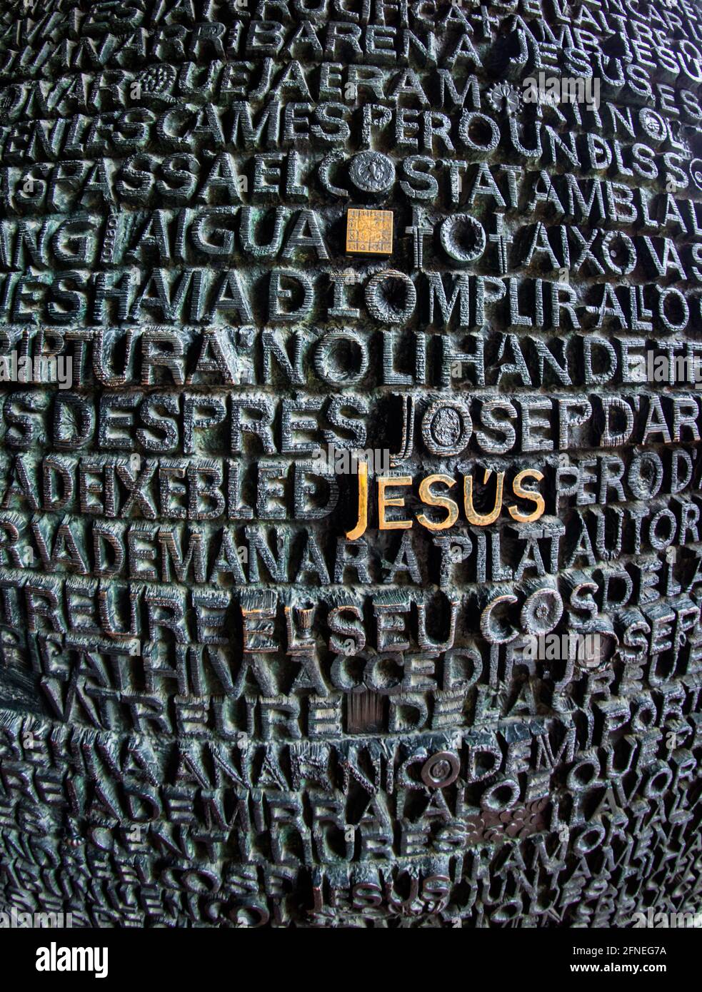 The bronze Gospel Doors at the Passion Facade of the Basilica de la Sagrada Familia. The doors include text from the New Testament depicting the Passi Stock Photo