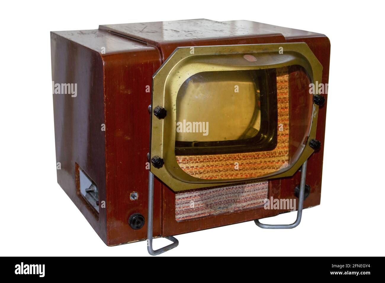 Old TV isolated on a white background. Wooden body and attachment lens for image enlargement. Stock Photo
