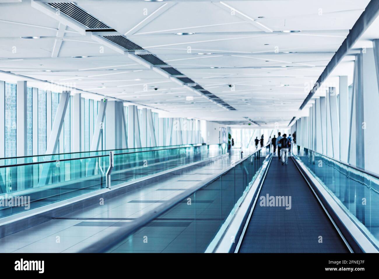 Moving flat escalator in subway in Dubai Stock Photo Alamy