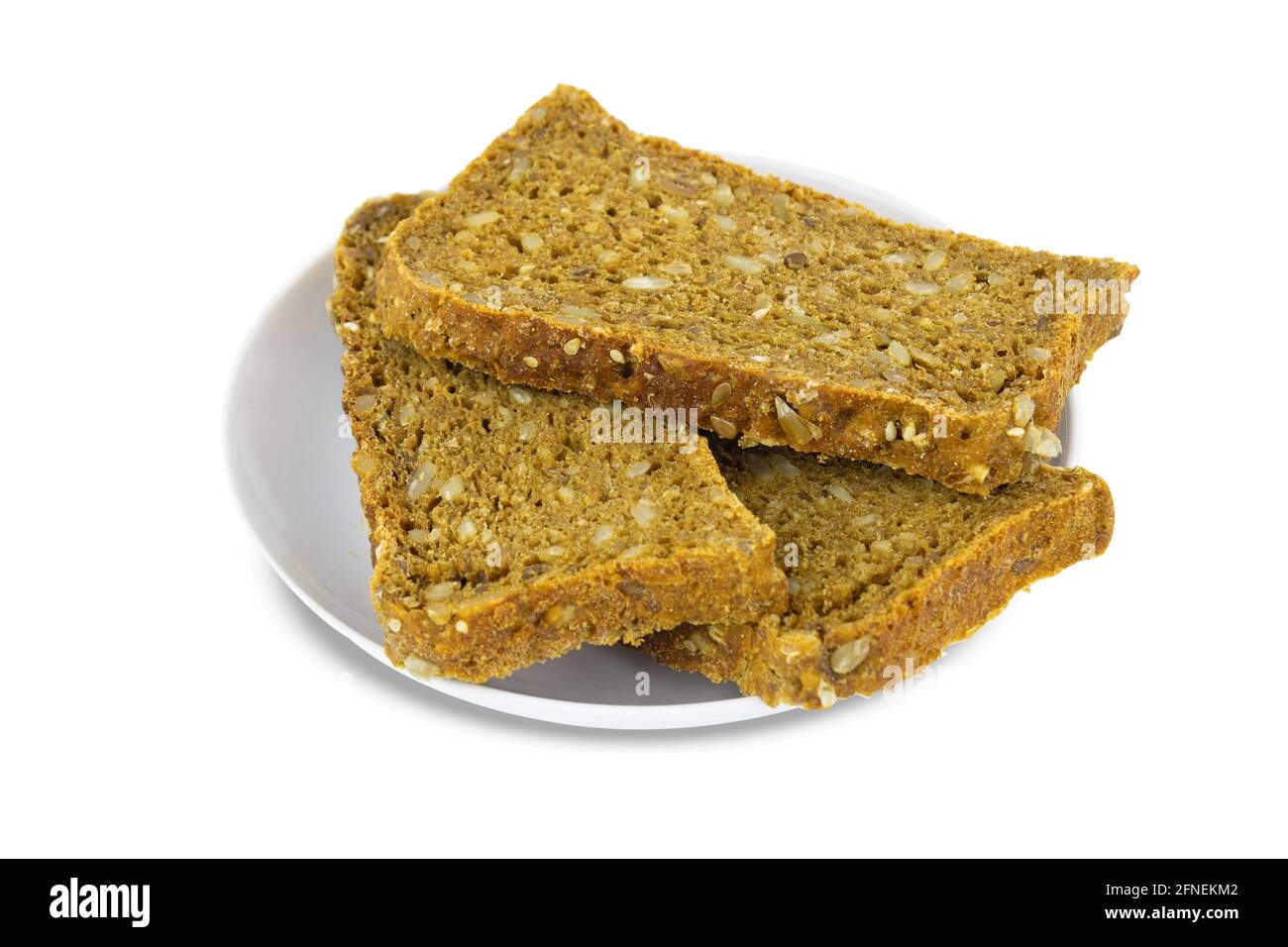 Three pieces of cereal bread on porcelain white saucer, isolated on white background. Stock Photo
