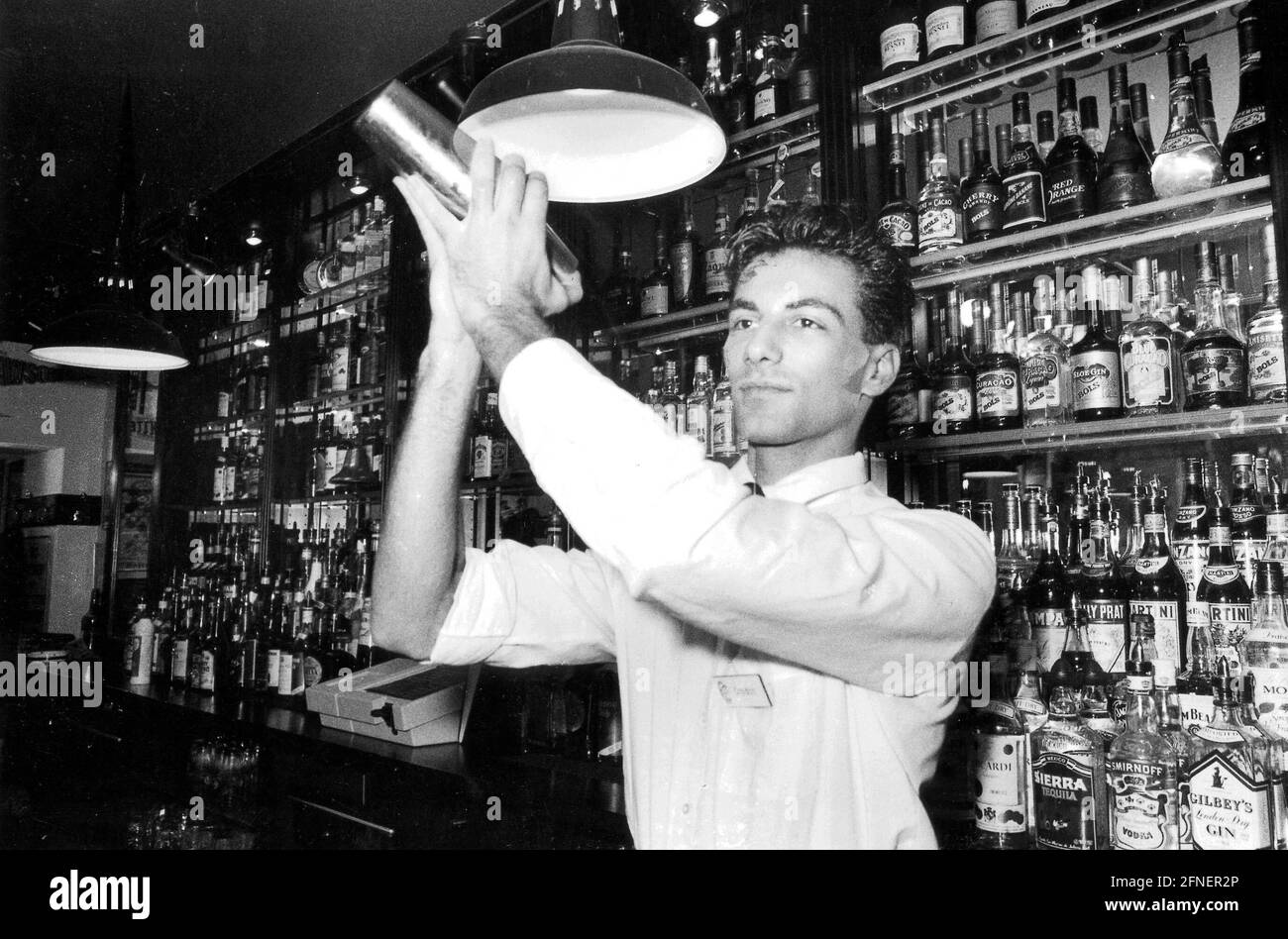 Bartender mixing a drink in a bar, 1999. [automated translation] Stock Photo