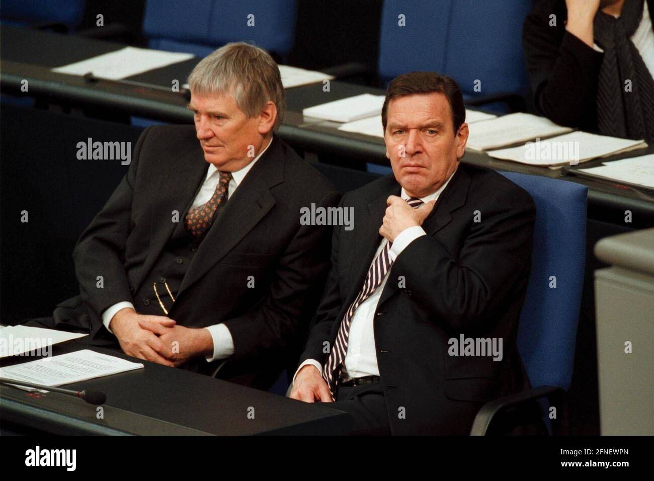 Federal Minister of the Interior Otto Schily, SPD, and Federal Chancellor Gerhard Schröder, SPD, during the debate on the 'Annual Report of the Federal Government on the State of German Unity', in the German Bundestag. [automated translation] Stock Photo